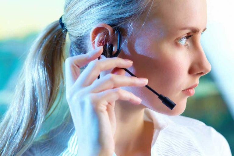 call center agent reviewing customer service survey after call